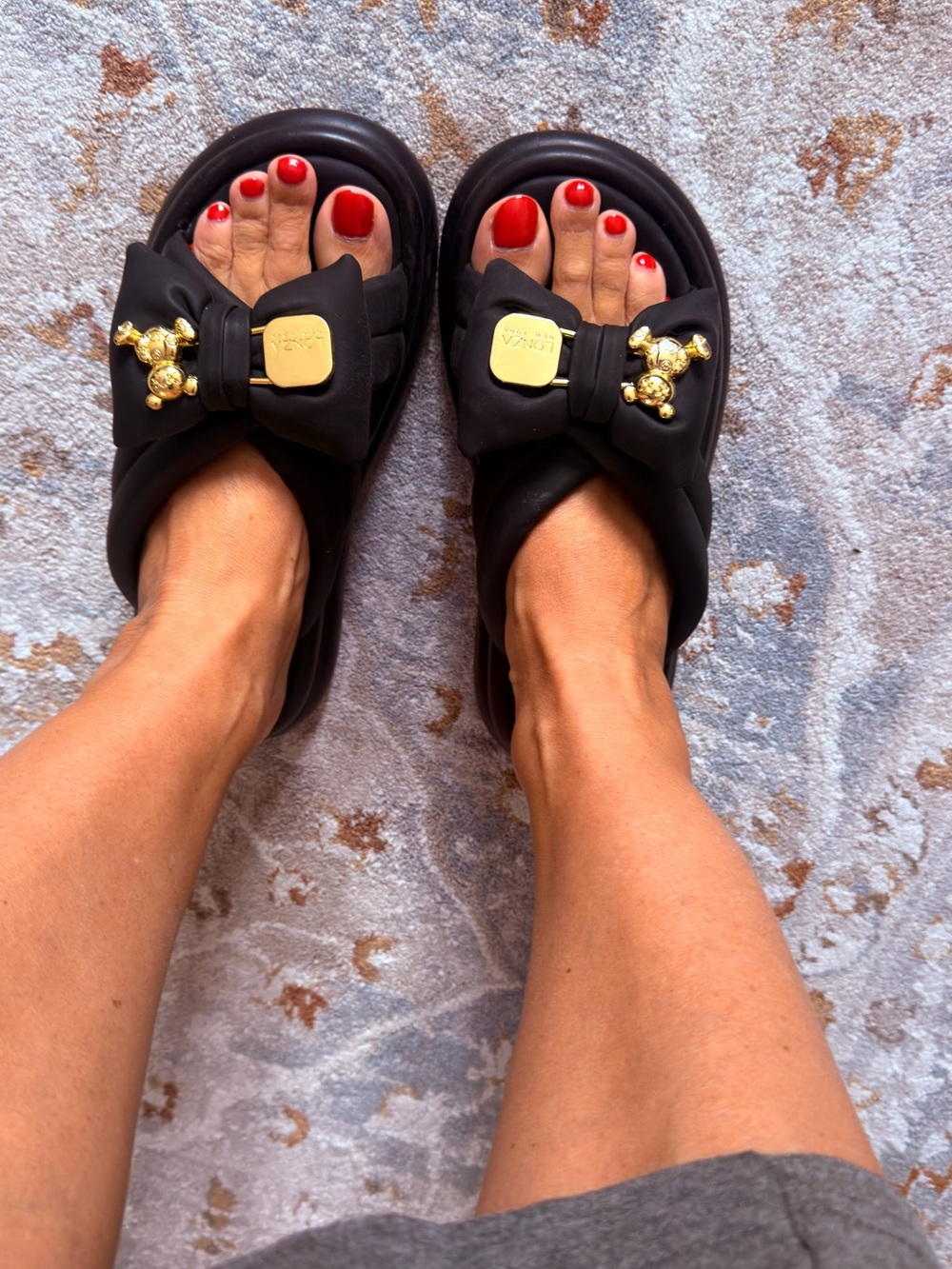 Black Bow Slide Sandals with Gold Emblem - Women